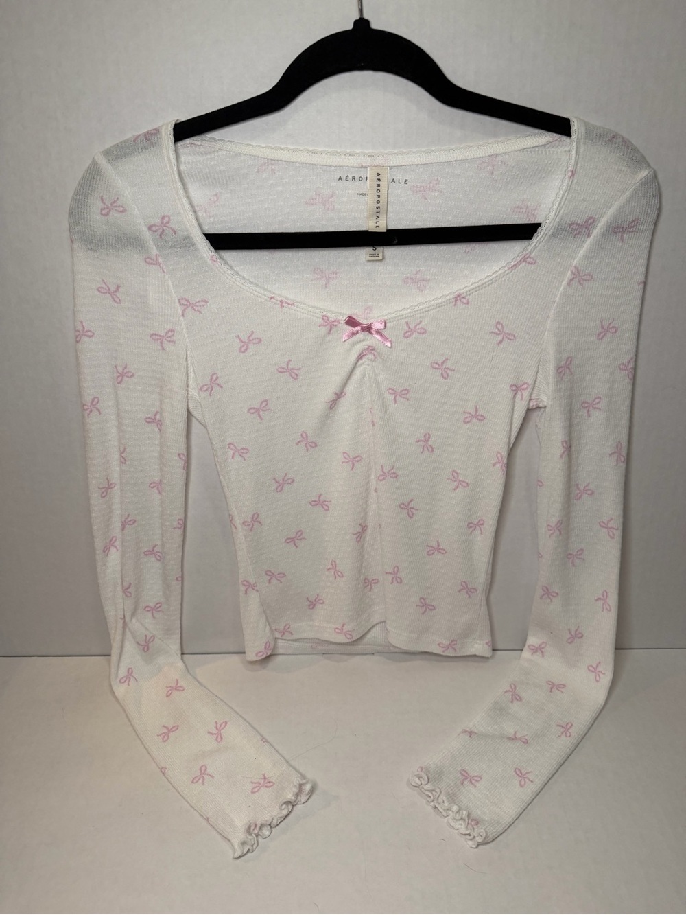 Aeropostale White Ribbed Long-Sleeve Top with Pink Bow Pattern